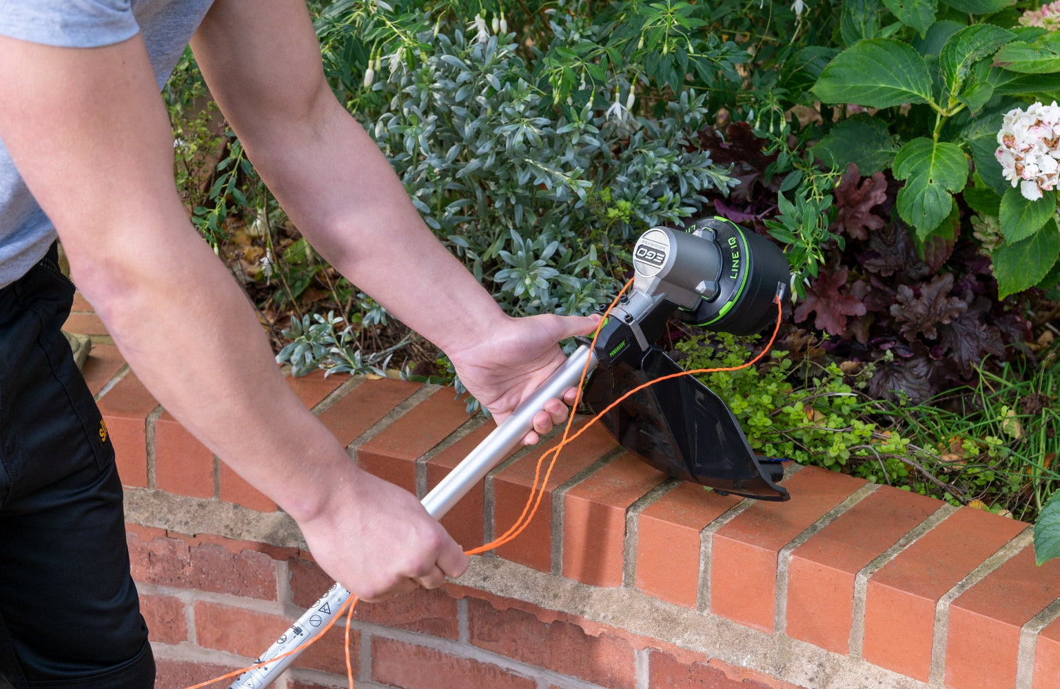 Vyžínač EGO POWER+ 40 cm samonavíjanie lanka a IQ line